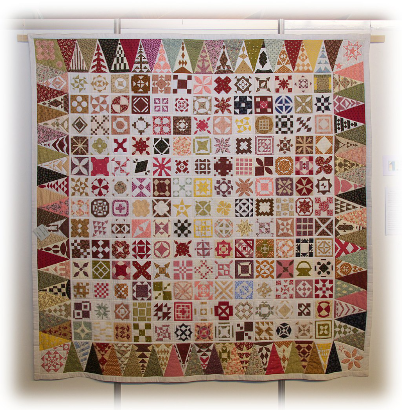 Photo of a Dear Jane quilt by Rossana Ramani, inspired by the 1863 Jane Stickle quilt 